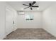 Bright bedroom with wood floors and a ceiling fan at 1152 W Greenway Dr, Tempe, AZ 85282