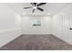 Spacious bedroom with grey carpet and a window with blinds at 1152 W Greenway Dr, Tempe, AZ 85282