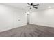 Bright bedroom featuring grey carpet and ceiling fan at 1152 W Greenway Dr, Tempe, AZ 85282