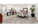 Elegant dining room with glass table and gray chairs at 1152 W Greenway Dr, Tempe, AZ 85282