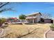 Spacious backyard featuring a lush lawn and pool area at 11553 N 76Th Dr, Peoria, AZ 85345