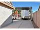 Covered carport with a large storage trailer parked at 11553 N 76Th Dr, Peoria, AZ 85345