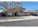 Two-story house with three-car garage and landscaping at 11553 N 76Th Dr, Peoria, AZ 85345