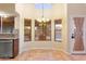 Bright breakfast nook with large window and tile flooring at 1157 E Liberty Ln, Gilbert, AZ 85296