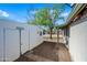 Backyard with storage shed and covered patio area at 1231 E Vine Ave, Mesa, AZ 85204