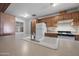 White double sink and light countertops in this kitchen at 1231 E Vine Ave, Mesa, AZ 85204