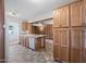 Bright kitchen features ample cabinetry and a view into the living area at 1231 E Vine Ave, Mesa, AZ 85204