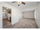 Open living room with a view into the kitchen area at 1231 E Vine Ave, Mesa, AZ 85204