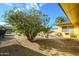 Spacious backyard with gravel and desert landscaping at 12323 W Tigerseye Dr, Sun City West, AZ 85375