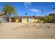 Backyard view of the home, showing a stone garden at 12323 W Tigerseye Dr, Sun City West, AZ 85375