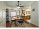 Dining area with wood table and chairs, near kitchen at 12323 W Tigerseye Dr, Sun City West, AZ 85375