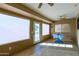 Sunroom with tiled floor and plenty of natural light at 12323 W Tigerseye Dr, Sun City West, AZ 85375