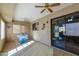 Bright sunroom with access to the backyard at 12323 W Tigerseye Dr, Sun City West, AZ 85375