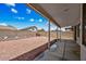 Desert landscaping and covered patio at 12930 W Pershing St, El Mirage, AZ 85335