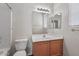 Clean bathroom with a vanity, toilet, and bathtub at 12930 W Pershing St, El Mirage, AZ 85335