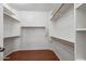 Large walk-in closet with ample shelving and hanging space at 12930 W Pershing St, El Mirage, AZ 85335