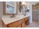 Double vanity bathroom with a large mirror and plenty of storage at 1397 E Cheyenne St, Gilbert, AZ 85296