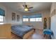 Cozy bedroom with a queen-size bed and wood flooring at 1397 E Cheyenne St, Gilbert, AZ 85296