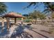 Community playground with shaded seating and BBQ at 1397 E Cheyenne St, Gilbert, AZ 85296