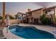 Relaxing kidney-shaped pool, patio furniture, and basketball court at 1540 W Orchid Ln, Chandler, AZ 85224