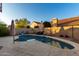 Private kidney-shaped pool with patio and lounge area at 1540 W Orchid Ln, Chandler, AZ 85224