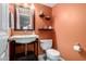 Clean powder room with single sink vanity at 1540 W Orchid Ln, Chandler, AZ 85224