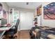 bedroom with a basketball theme, built-in shelving, and a desk at 1540 W Orchid Ln, Chandler, AZ 85224