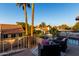 Relaxing deck with seating area overlooking backyard at 1540 W Orchid Ln, Chandler, AZ 85224