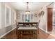 Bright dining area with wood table and bench seating at 1540 W Orchid Ln, Chandler, AZ 85224