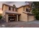 Two-story house with attached garage and front porch swing, landscaping at 1540 W Orchid Ln, Chandler, AZ 85224