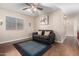 Bright living room featuring hardwood floors and a built-in bench at 1540 W Orchid Ln, Chandler, AZ 85224