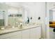 Elegant bathroom with double vanity and granite countertop at 15541 S 181St Ln, Goodyear, AZ 85338