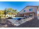 Inviting backyard oasis with a sparkling pool, ample lounge space, and lush landscaping at 16614 N 51St St, Scottsdale, AZ 85254