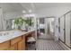 Elegant bathroom with a double vanity and a large mirror at 16614 N 51St St, Scottsdale, AZ 85254