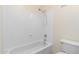 Clean bathroom with a shower/tub combo and a toilet at 16614 N 51St St, Scottsdale, AZ 85254