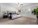 Main bedroom with plush bed and neutral color scheme, ceiling fan included at 16614 N 51St St, Scottsdale, AZ 85254