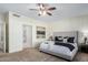 Bright bedroom featuring a plush bed and ample natural light at 16614 N 51St St, Scottsdale, AZ 85254