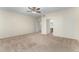 Bright bedroom with ceiling fan and access to bathroom at 16614 N 51St St, Scottsdale, AZ 85254