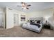 Serene bedroom with a comfy bed and access to a private bathroom at 16614 N 51St St, Scottsdale, AZ 85254