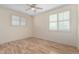 Bedroom with wood flooring, ceiling fan and shutters at 16614 N 51St St, Scottsdale, AZ 85254