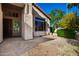 Welcoming front porch with stone flooring and landscaping at 16614 N 51St St, Scottsdale, AZ 85254