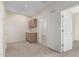 Home hallway with built-in cabinets and doors at 16614 N 51St St, Scottsdale, AZ 85254