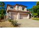 Two-story house with double garage and landscaping at 16614 N 51St St, Scottsdale, AZ 85254