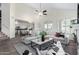 Bright living room with open floor plan, featuring a comfy sectional sofa and high ceilings at 16614 N 51St St, Scottsdale, AZ 85254