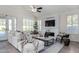 Bright and airy living room with a modern fireplace and comfortable seating at 16614 N 51St St, Scottsdale, AZ 85254