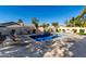 Relaxing pool area with lounge chairs and a beautiful water feature at 16614 N 51St St, Scottsdale, AZ 85254