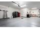 Spacious garage with workshop area and extra storage at 17215 W Molly Ln, Surprise, AZ 85387