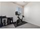 Home gym with stationary bike and other exercise equipment at 17215 W Molly Ln, Surprise, AZ 85387