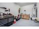 Well-equipped workshop with ample storage and workbench at 17215 W Molly Ln, Surprise, AZ 85387