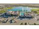 Aerial view of community features including pool and lake at 17256 W West Wind Dr, Surprise, AZ 85387